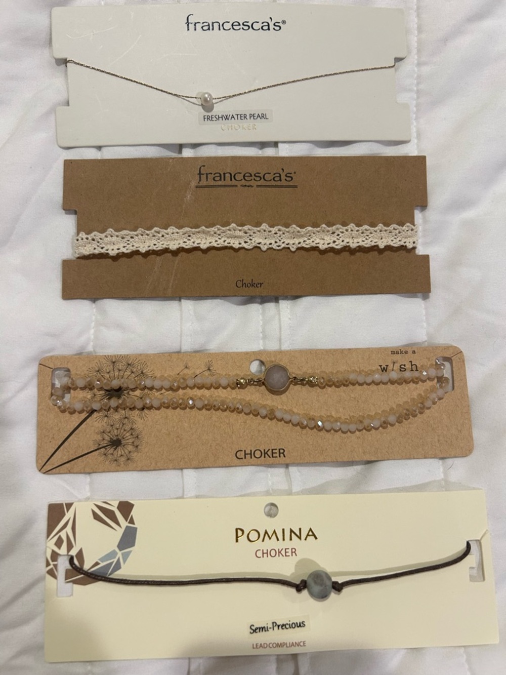 Four Choker Set - includes 2 Francesca’s, 1 double choker and 1 cord with stone.